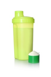 Protein shake in sport bottle and scoop with powder isolated on white