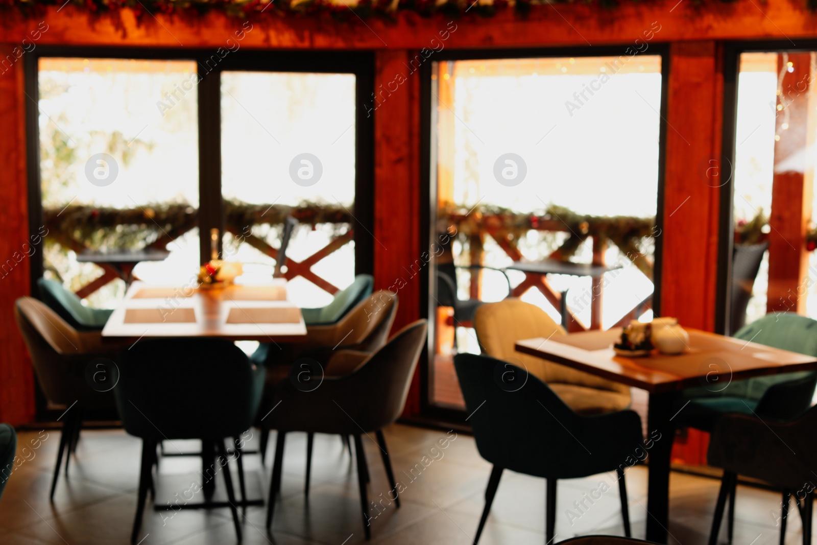 Photo of Blurred view of modern cafe interior with new stylish furniture