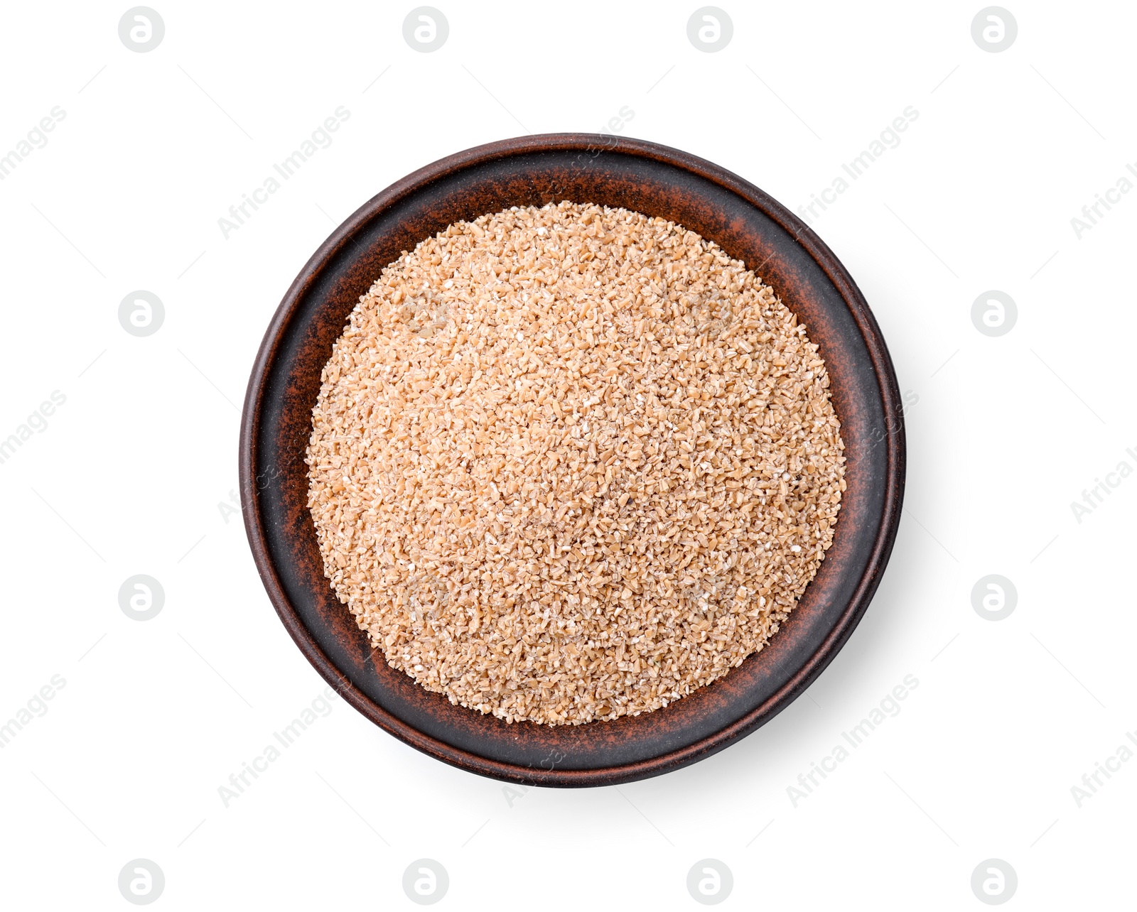 Photo of Dry wheat groats in bowl isolated on white, top view