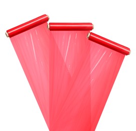 Image of Rolls of red plastic stretch wrap on white background