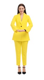 Photo of Beautiful businesswoman in yellow suit on white background