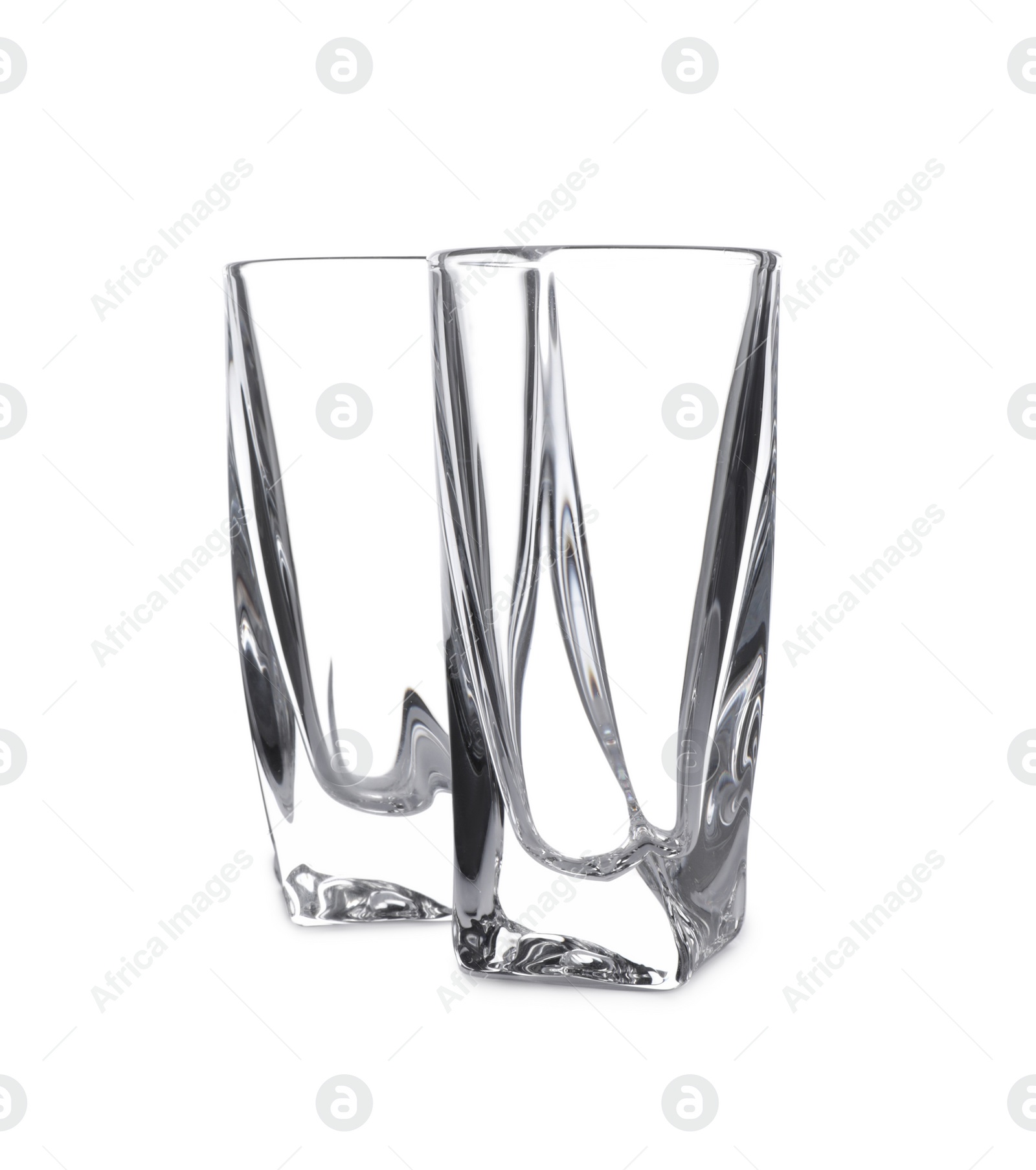 Photo of Elegant clean empty highball glasses isolated on white
