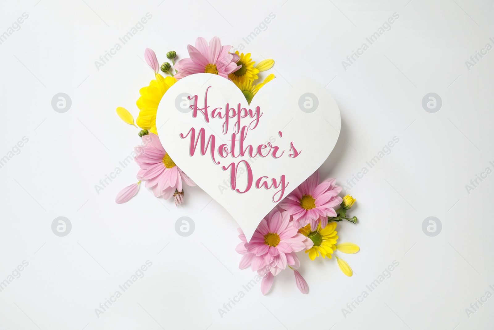 Image of Happy Mother's Day greeting card in shape of heart and beautiful flowers on white background, flat lay