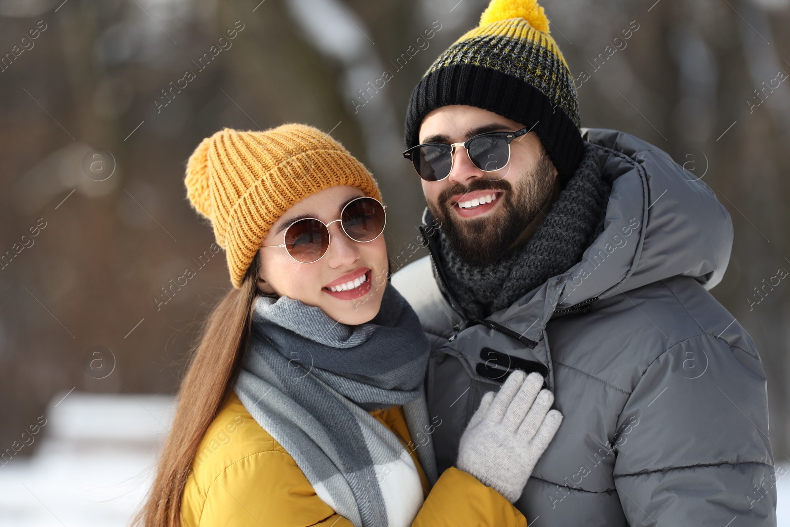 Photo of Beautiful happy couple outdoors on winter day