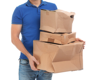 Photo of Courier with damaged cardboard boxes on white background, closeup. Poor quality delivery service