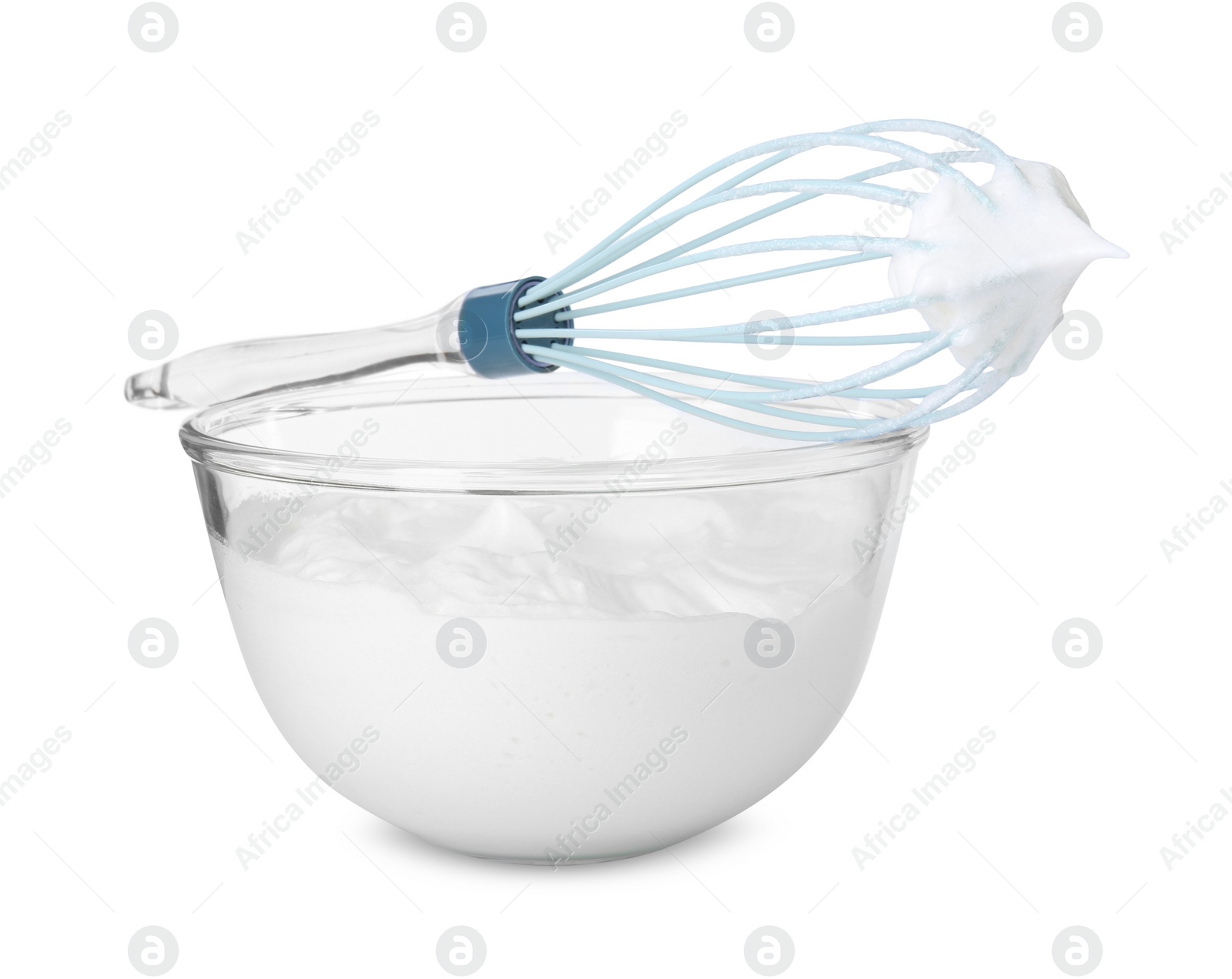 Photo of Bowl with whipped cream and whisk isolated on white