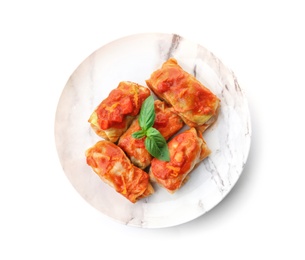 Photo of Plate with delicious cabbage rolls on white background, top view