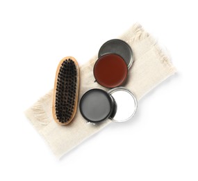 Photo of Set of shoe care products on white background, top view