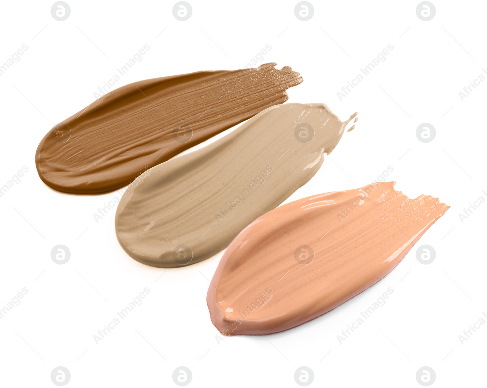 Image of Foundation of various shades for different skin tones isolated on white, top view. Set of samples