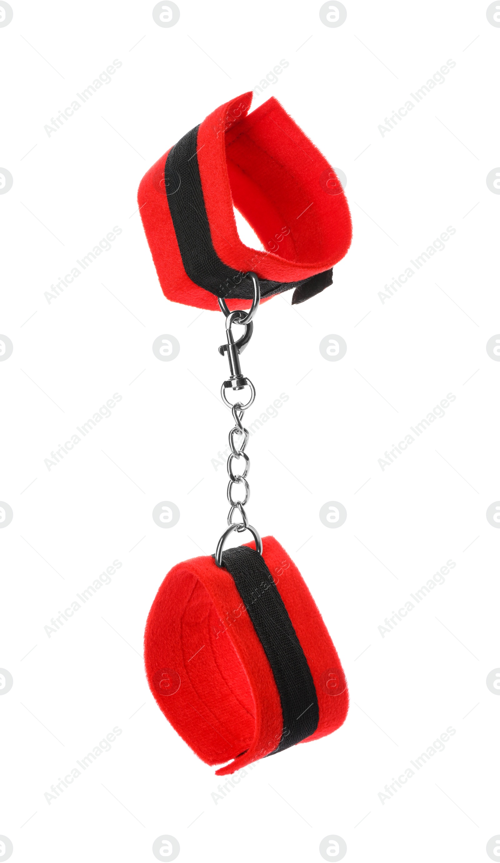 Photo of Wrist handcuffs on white background. Accessory for sexual roleplay