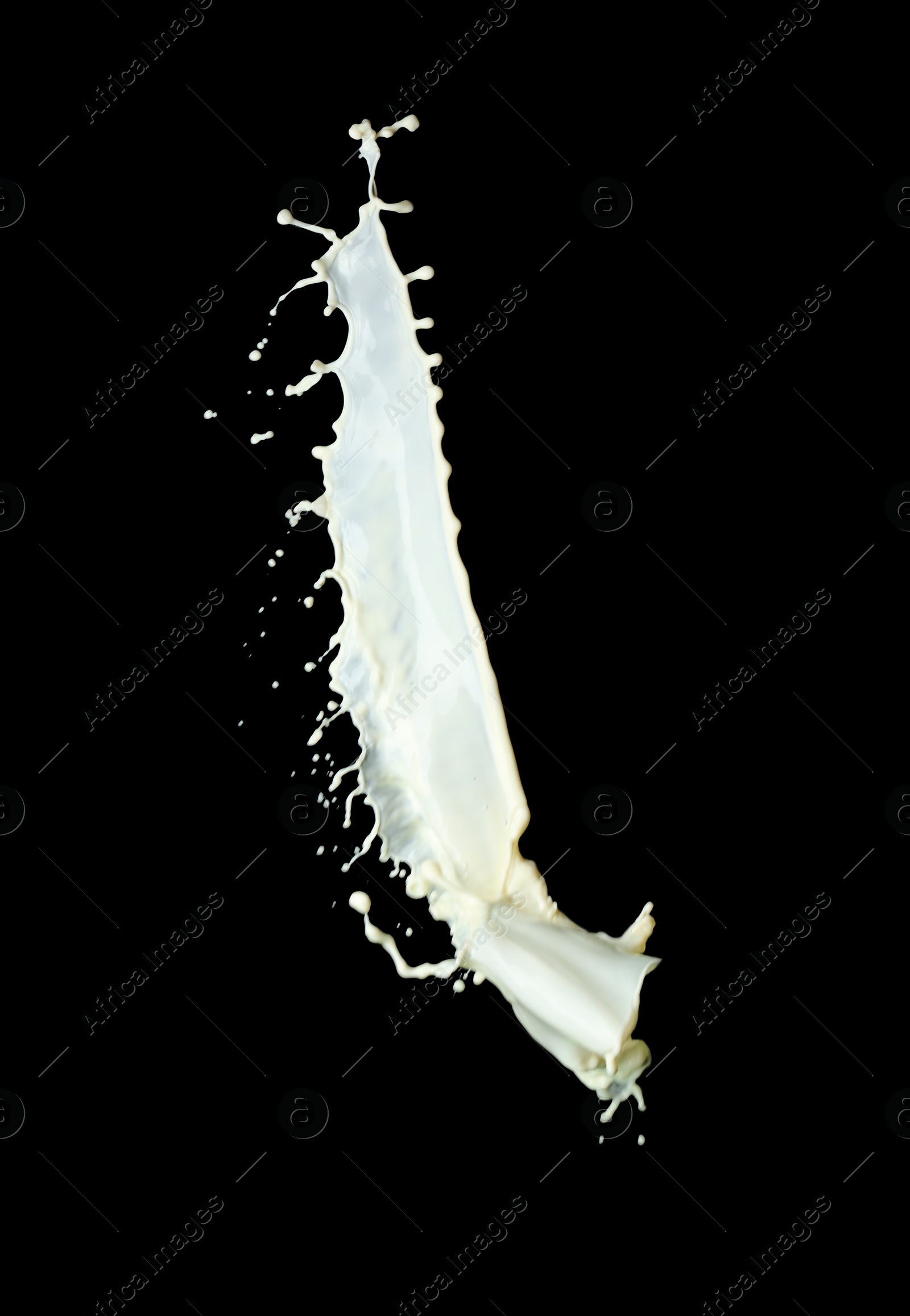 Photo of Splash of fresh milk on black background