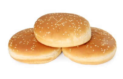 Three fresh hamburger buns isolated on white
