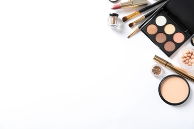 Photo of Different luxury makeup products on white background, top view