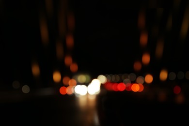 Blurred view of city lights at night. Bokeh effect