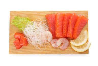 Photo of Delicious sashimi set of salmon and shrimps served with funchosa, lemon and lettuce isolated on white, top view