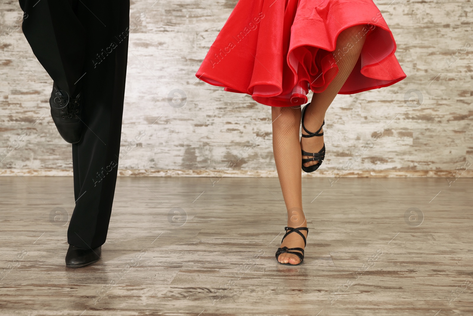 Photo of Couple of kids dancing together in studio, closeup