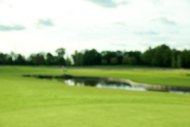 Photo of Blurred view of golf course on sunny day