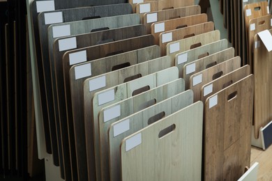 Many different samples of wooden flooring in store