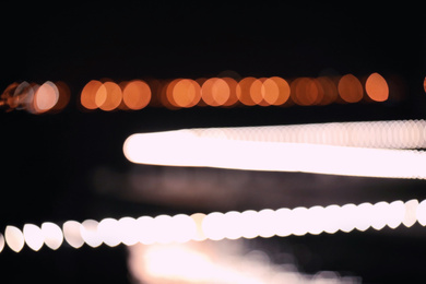 Photo of Blurred view of night city. Bokeh effect