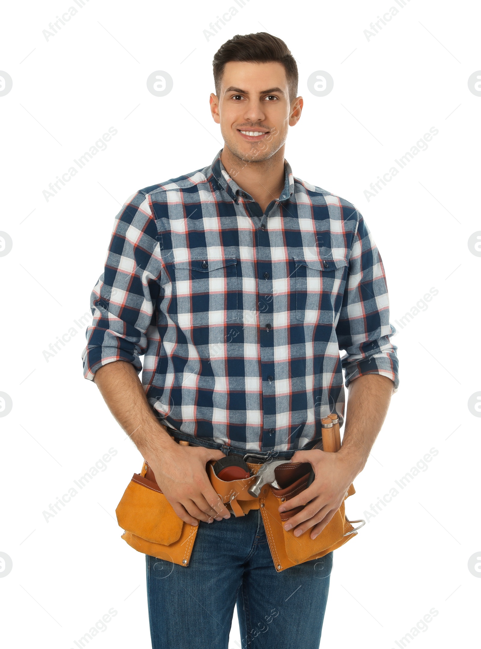 Photo of Handsome carpenter with tool belt isolated on white