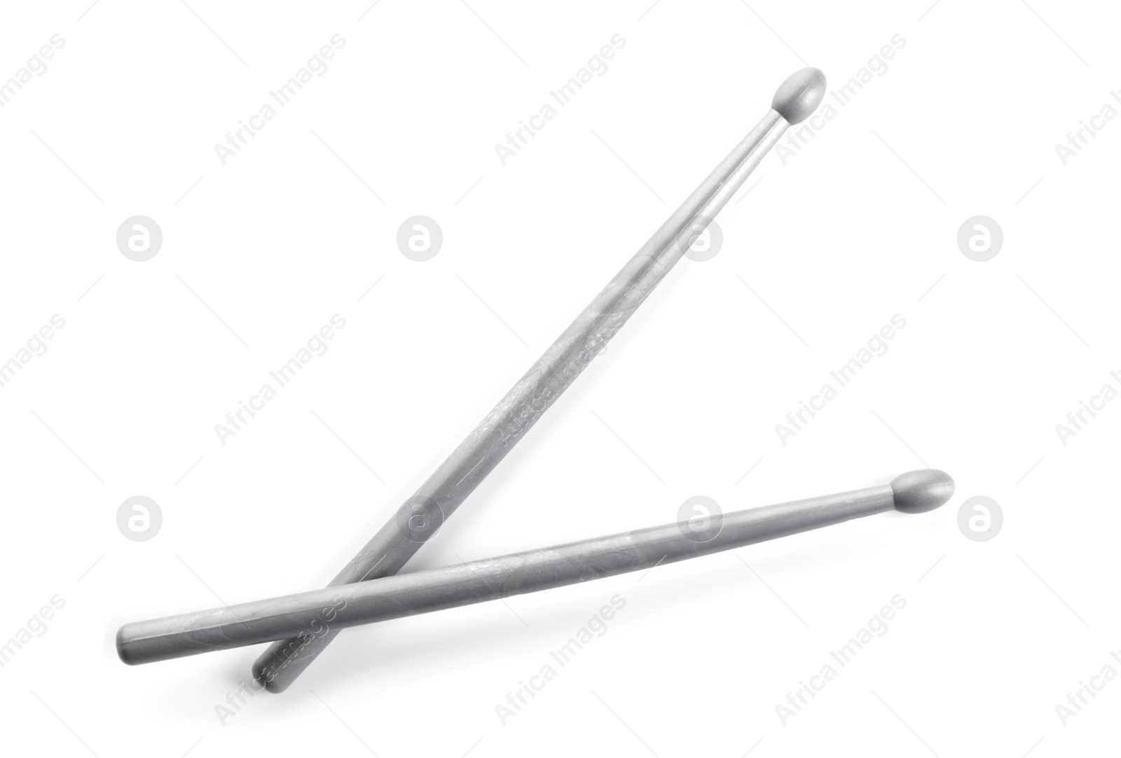 Photo of Two drum sticks isolated on white, top view
