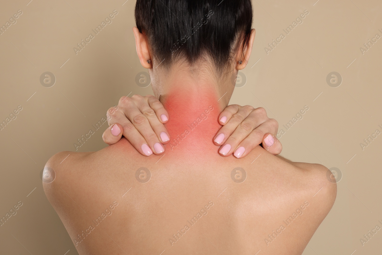 Image of Back view of woman with perfect smooth skin on beige background, closeup