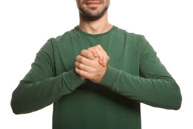 Photo of Man showing BELIEVE gesture in sign language on white background, closeup