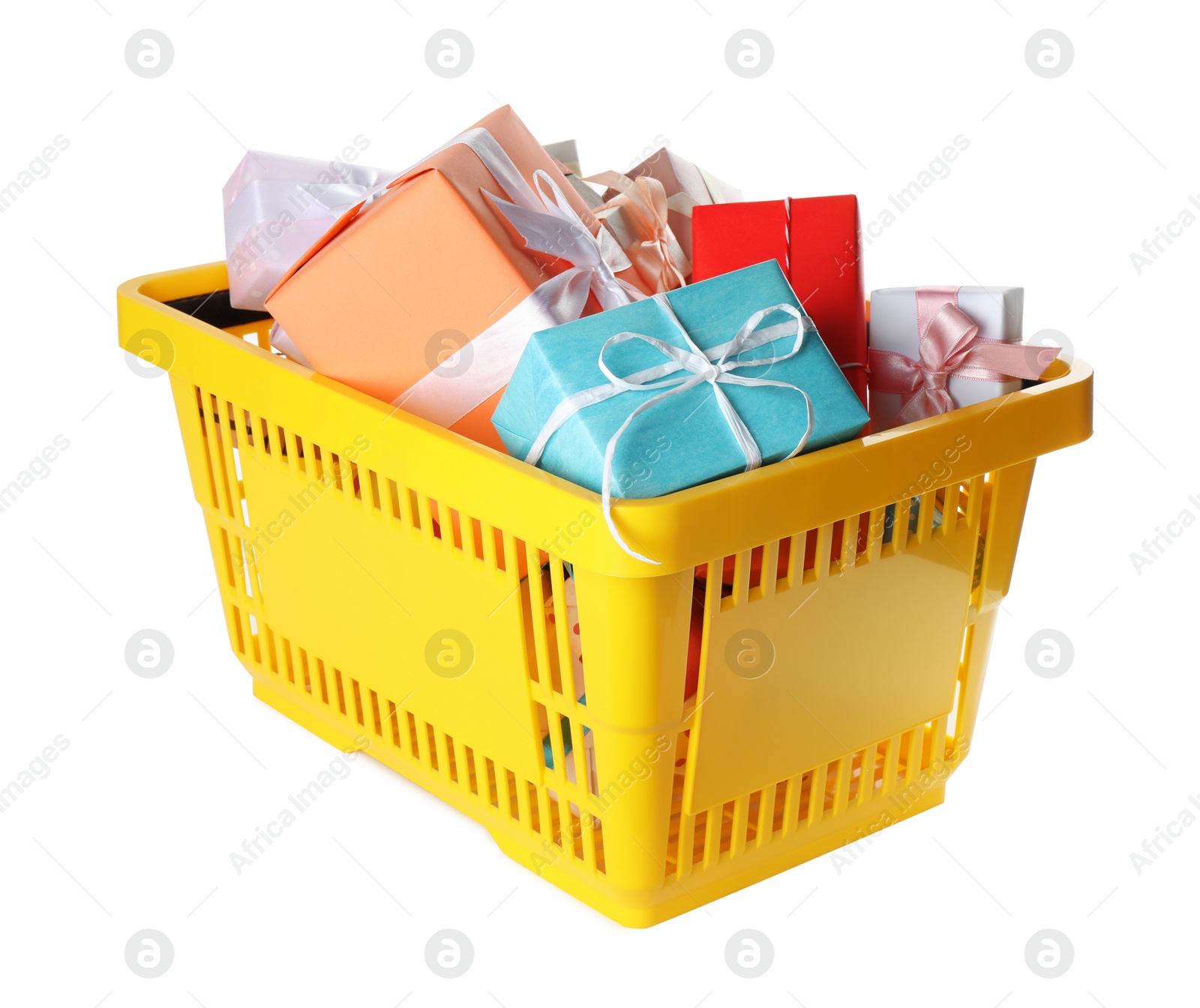 Photo of Shopping basket full of gift boxes on white background