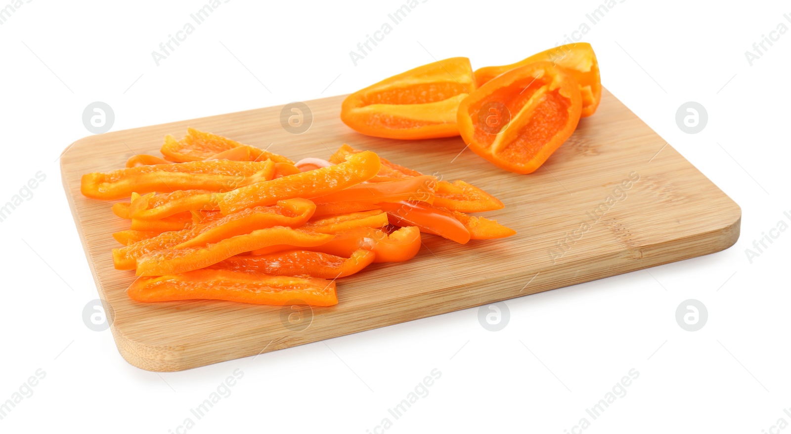 Photo of Cut fresh orange bell peppers isolated on white