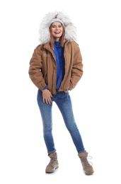 Photo of Young woman wearing warm clothes on white background. Ready for winter vacation