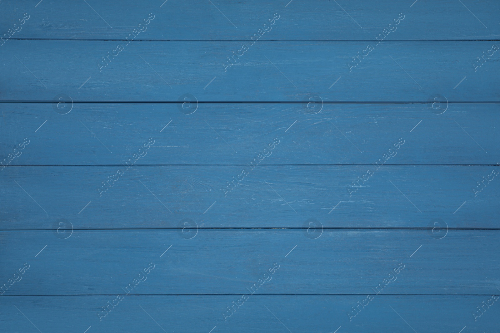 Photo of Texture of blue wooden surface as background, top view