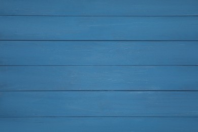 Photo of Texture of blue wooden surface as background, top view