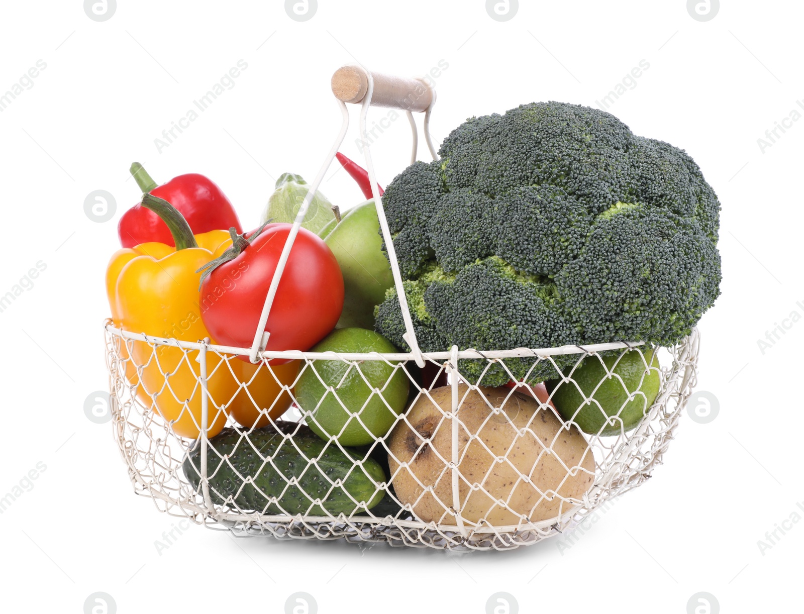 Photo of Fresh ripe vegetables and fruits in basket on white background