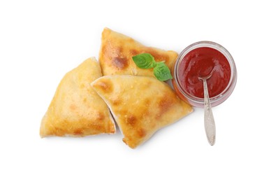 Photo of Delicious samosas, basil and tomato sauce isolated on white, top view