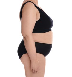Overweight woman in underwear on white background, closeup