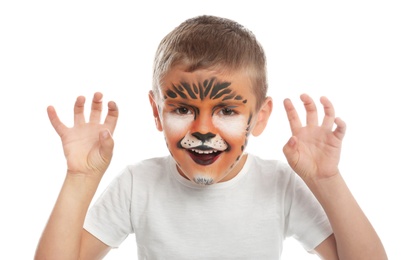 Photo of Cute little boy with face painting on white background