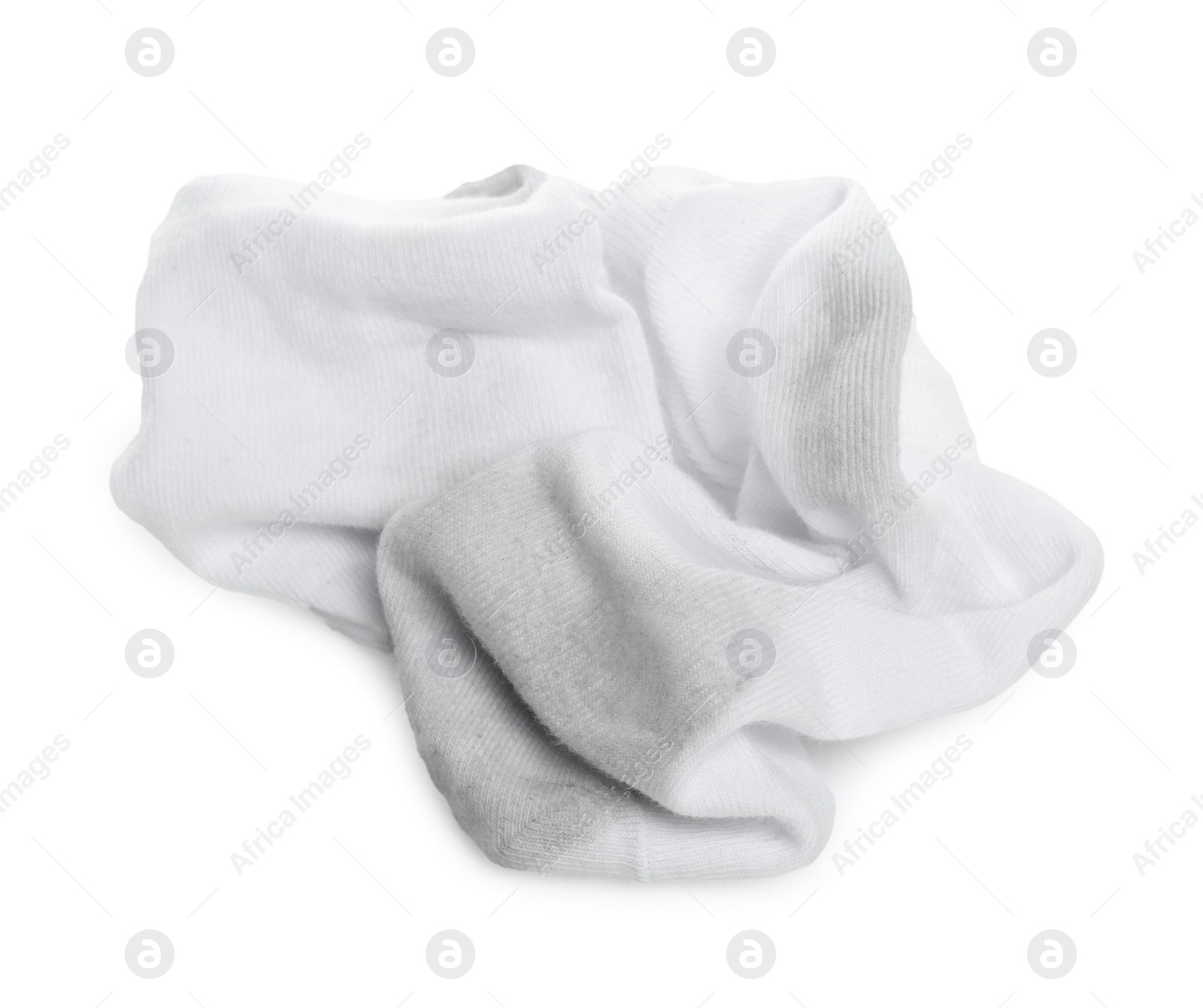 Photo of Pair of dirty socks on white background