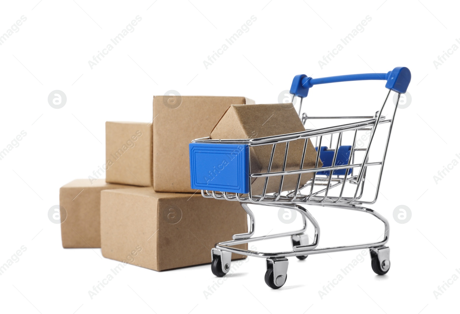 Photo of Shopping cart and boxes isolated on white. Logistics and wholesale concept