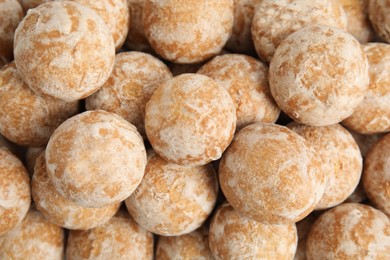 Tasty homemade gingerbread cookies as background, top view