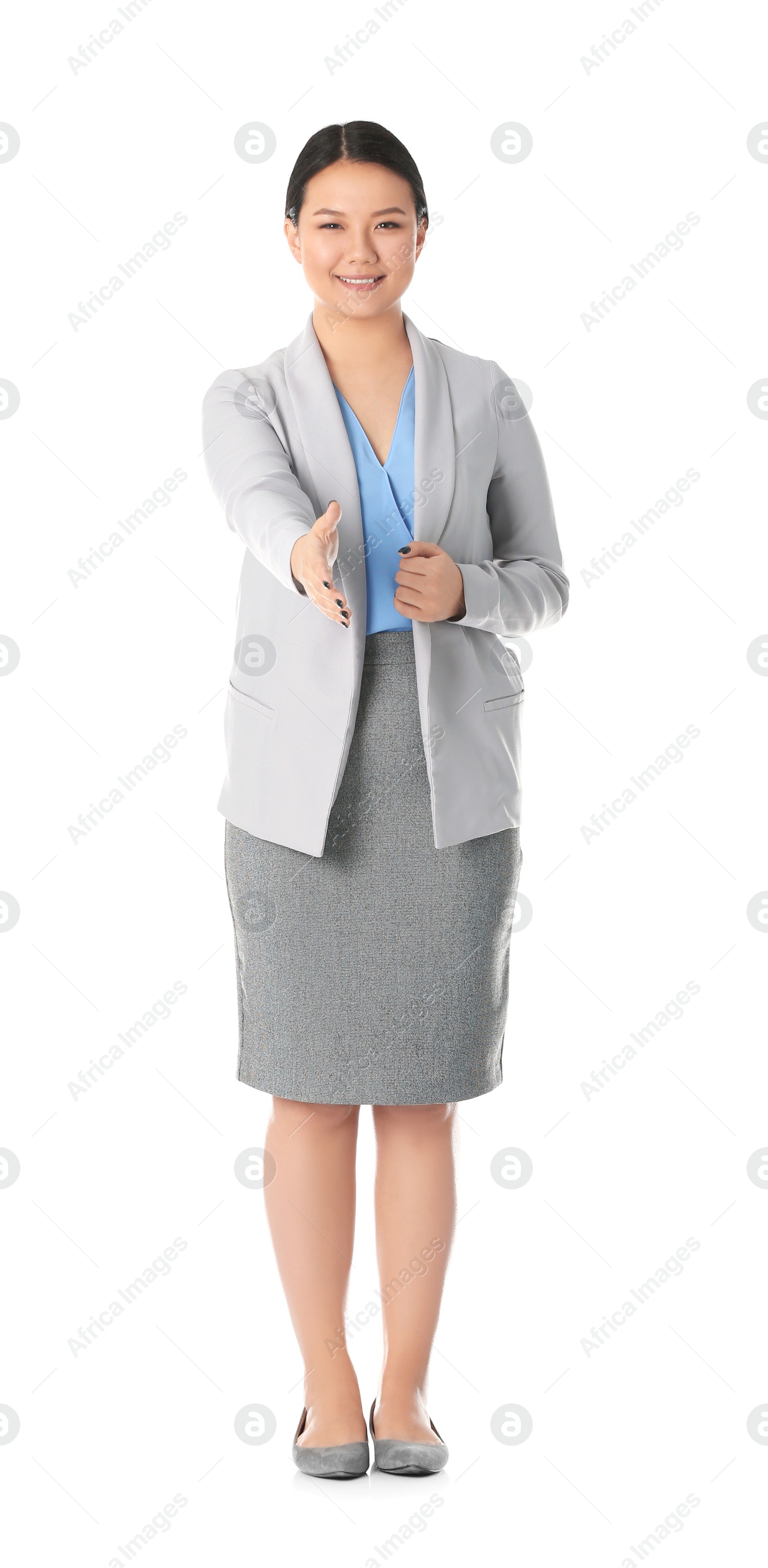 Photo of Business trainer reaching out for handshake on white background