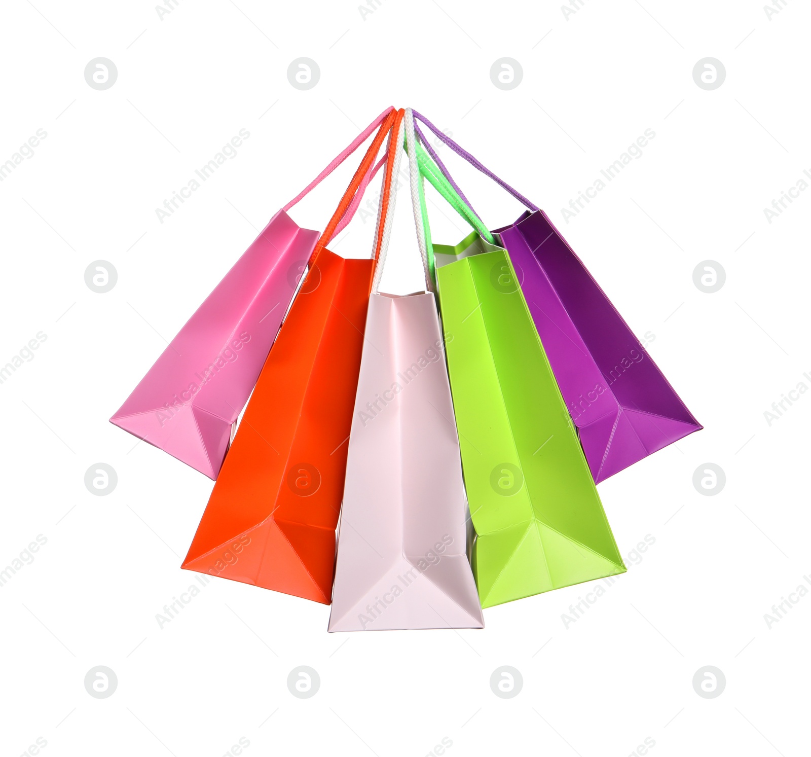 Photo of Colorful paper shopping bags isolated on white