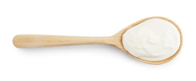 One wooden spoon with mayonnaise isolated on white, top view