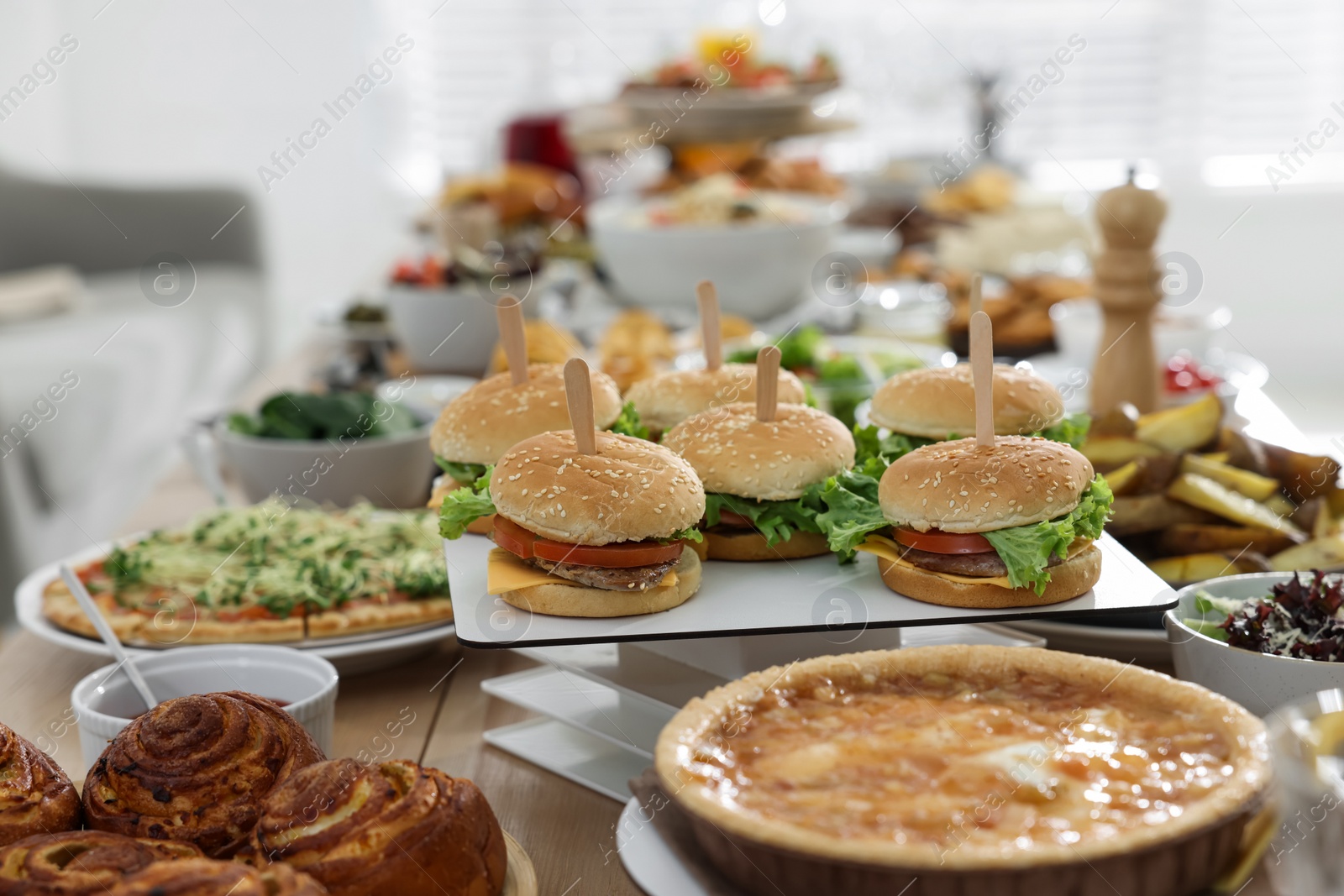 Photo of Brunch table setting with different delicious food indoors