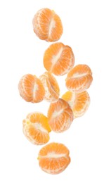 Image of Tasty peeled tangerines falling on white background