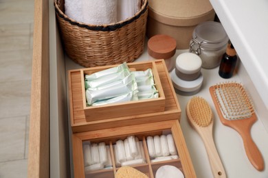 Photo of Keeping tampons and other self care products in drawer