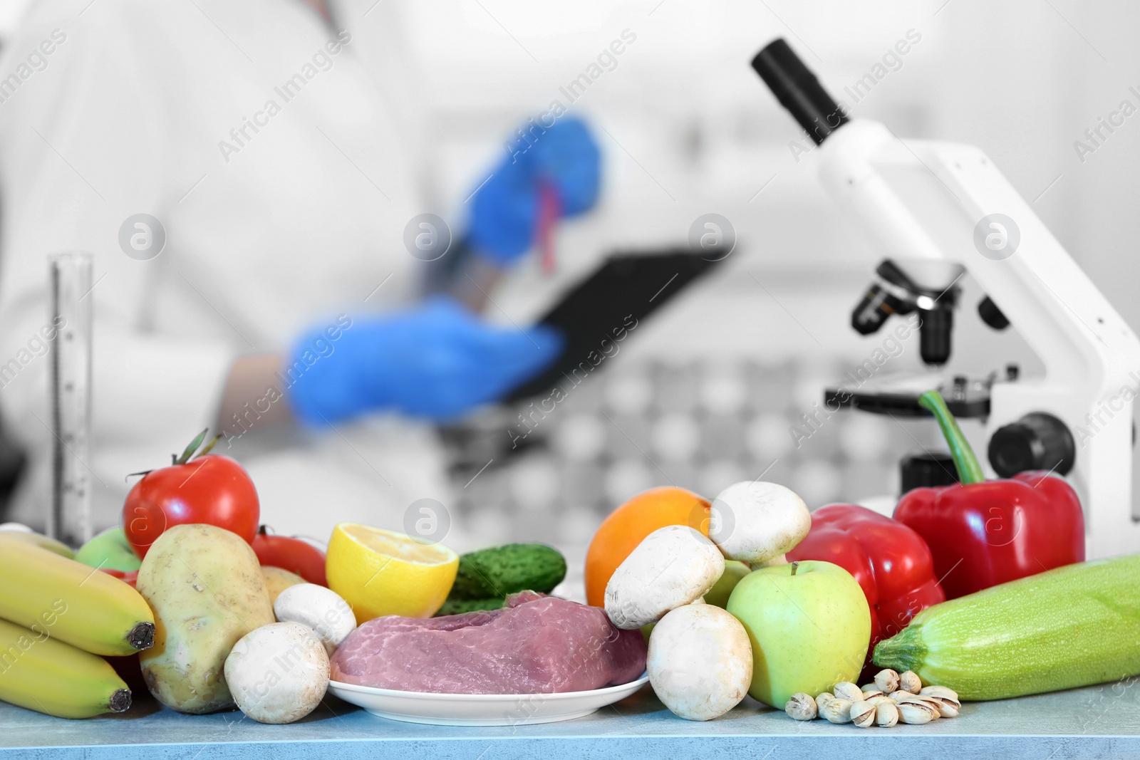 Photo of Fresh vegetables, fruits and meat on table in laboratory. Food quality control