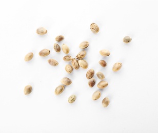 Photo of Raw organic hemp seeds on white background, top view