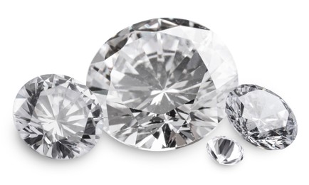 Image of Many beautiful dazzling diamonds on white background