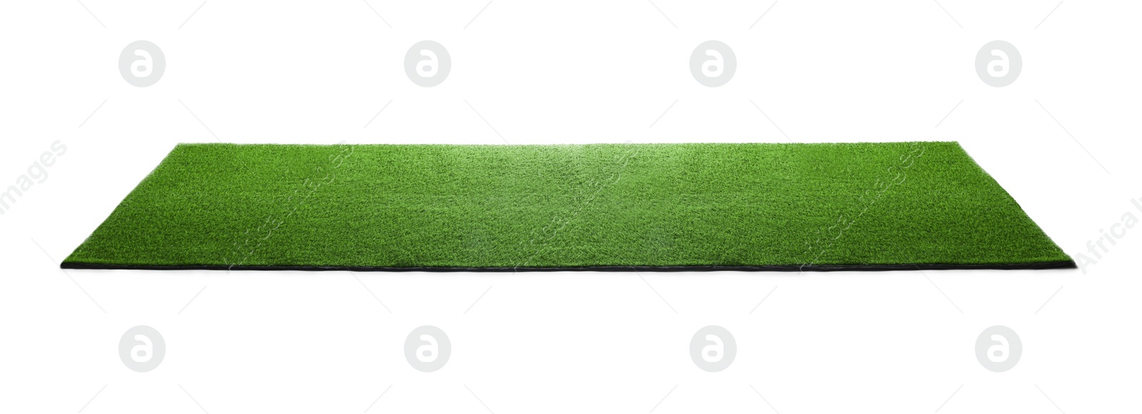 Photo of Green artificial grass carpet isolated on white