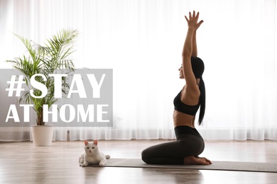 Image of Hashtag Stay At Home - protective measure during coronavirus pandemic. Young woman practicing yoga in room